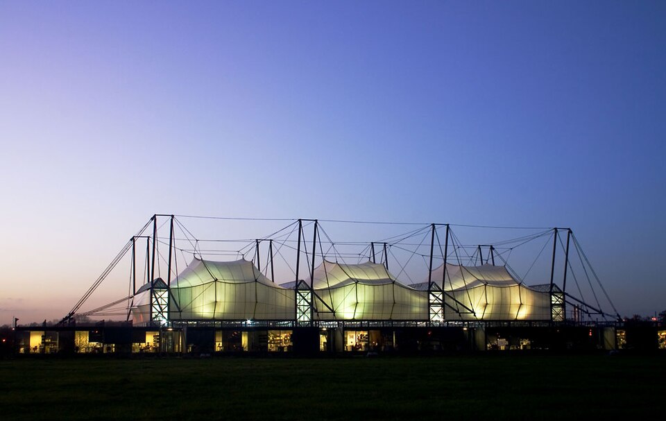 PTFE-coated fibreglass tensile roof — representative photo